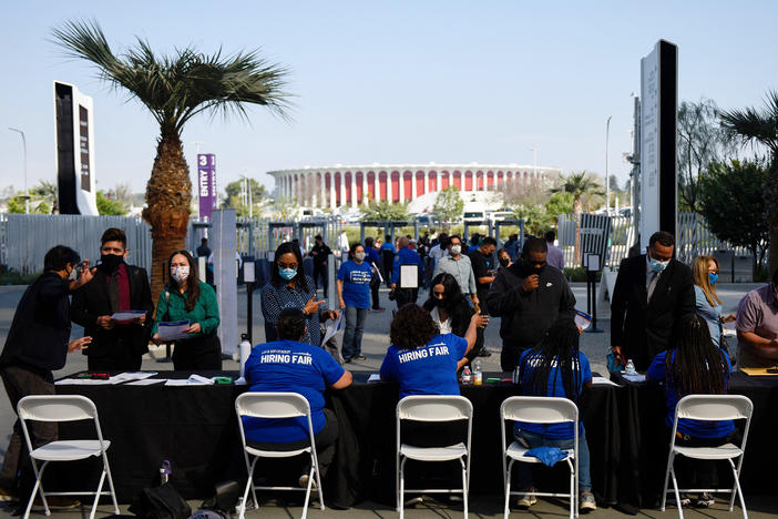 Los Angeles International Airport and SoFi Stadium employers spoke with potential job applicants at a job fair in Inglewood, Calif., in September. About 19% of all households in an NPR poll say they lost all their savings during the COVID-19 outbreak, and have none to fall back on.