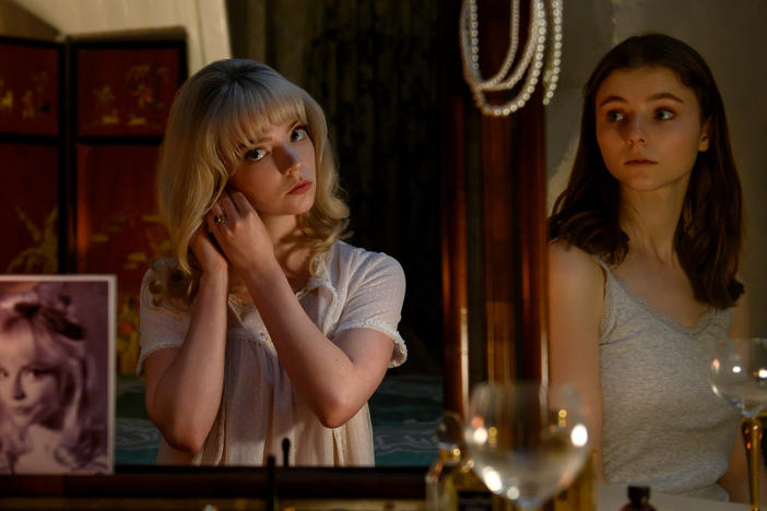 Sandie (Anya Taylor-Joy) and Eloise (Thomasin McKenzie) merge minds, bodies and fashion senses in<em> Last Night in Soho.</em>