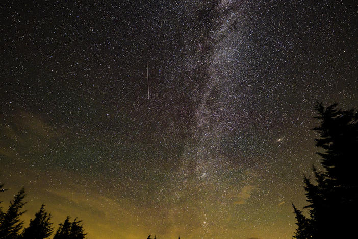In this 30 second exposure, a meteor streaks across the sky during the annual Perseid meteor shower on Aug. 10, 2021, in Spruce Knob, West Virginia.
