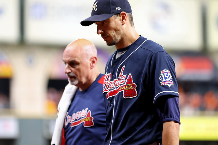 Atlanta pitcher Charlie Morton left Game 1 of the World Series against the Houston Astros with an injury that was later diagnosed as a fractured fibula.