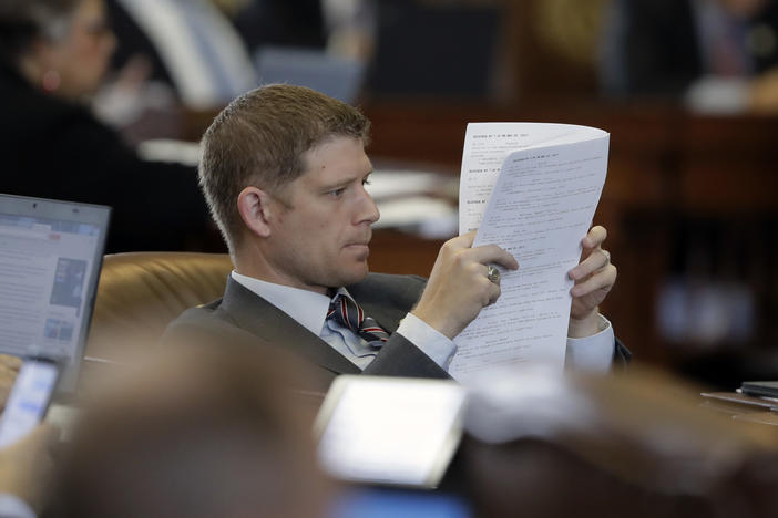 Texas state Rep. Matt Krause looks over the calendar as lawmakers rush to finish business in Austin, Texas, in May 2017.