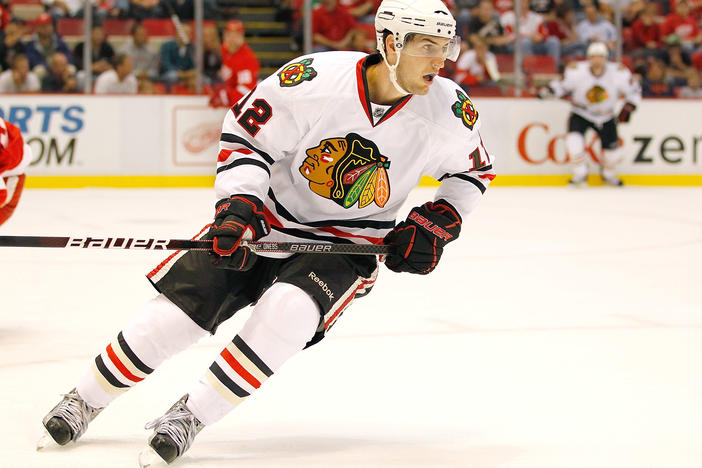 Kyle Beach #12 of the Chicago Blackhawks skates against the Detroit Red Wings during a preseason game in September 2010 at the Joe Louis Arena in Detroit.