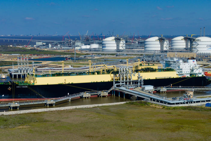 The Asia Vision LNG carrier ship sits docked at the Cheniere Energy Inc. terminal in this aerial photograph taken over Sabine Pass in Texas in 2016.
