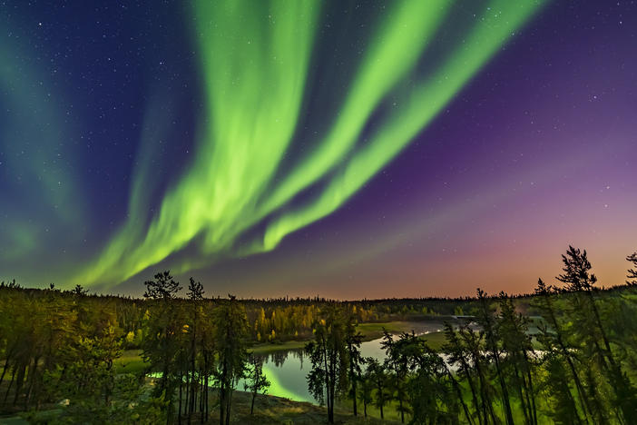 The northern lights can be seen from the Cameron River viewpoint off the Ramparts Falls trail on the Ingraham Trail near Yellowknife, Canada.