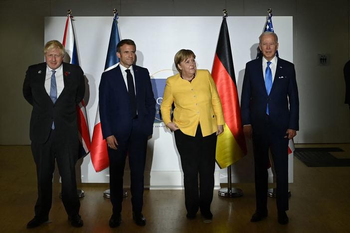 British Prime Minister Boris Johnson (from left), French President Emmanuel Macron, German outgoing Chancellor Angela Merkel and President Biden meet in Rome to discuss renewed talks over the Iran nuclear deal.