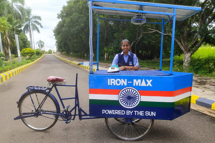 Vinisha Umashankar and her solar ironing cart. She came up with the idea when she was 12 — then worked with engineers to create a prototype. Now she's in Glasgow, Scotland, to speak at the COP26 climate change conference.