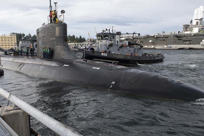 The Seawolf-class fast-attack submarine USS Connecticut smacked an undersea mountain, the Navy says. The vessel is seen here leaving Naval Base Kitsap-Bremerton for a trip across the Pacific Ocean in May.