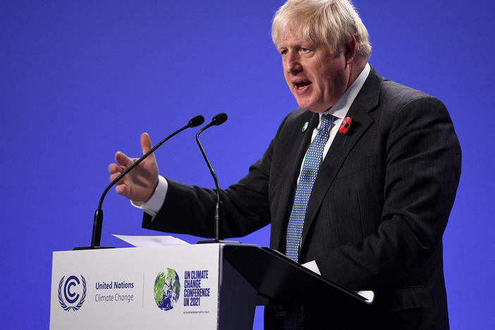 British Prime Minister Boris Johnson speaks during a news conference at the U.N. Climate Change Conference COP26 in Glasgow, Scotland, on Tuesday.