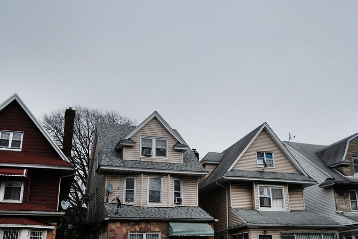 Homes line the street of a neighborhood in Brooklyn, N.Y., in March. Zillow announced it will stop buying and reselling homes, citing the volatility of the housing market.