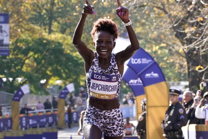 Women's division winner Peres Jepchirchir of Kenya crosses the finish line during the 2021 TCS New York City Marathon in New York on November 7, 2021.