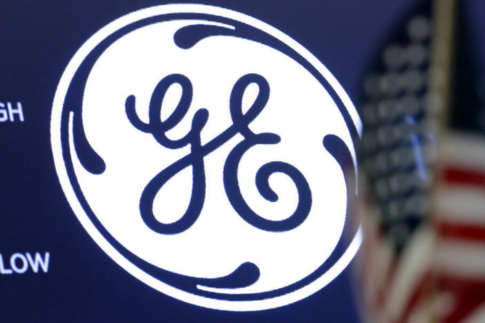 The General Electric logo appears above a trading post on the floor of the New York Stock Exchange in 2018.