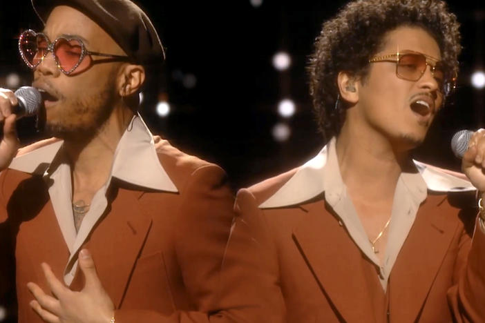 Anderson .Paak and Bruno Mars perform as Silk Sonic during the 2021 Grammy Awards broadcast.