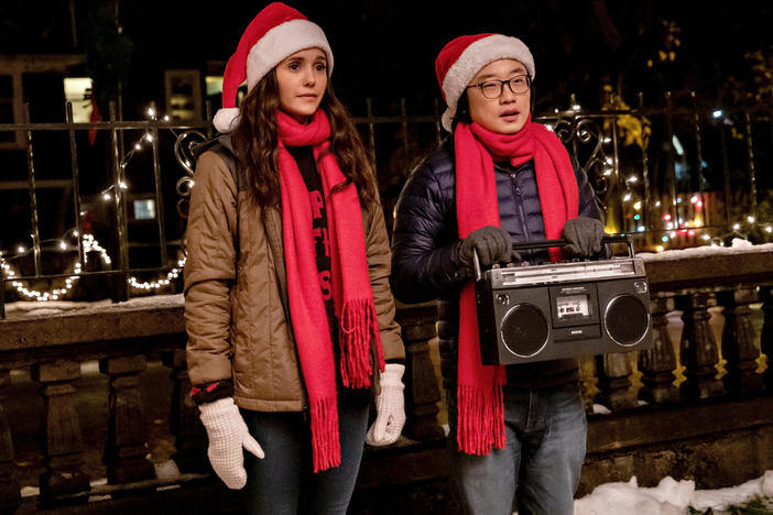 Nina Dobrev and Jimmy O. Yang in <em>Love Hard</em>.