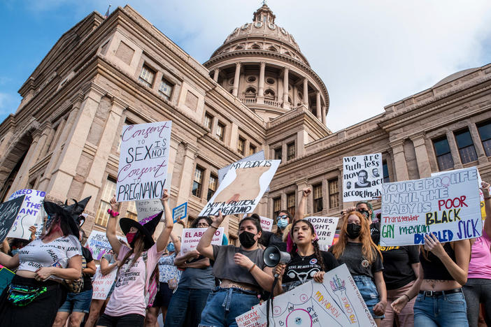 Protesters take part in the Women's March and Rally for Abortion Justice in Austin, Texas, on Oct. 2. The demonstration targeted Senate Bill 8, a state law that bans nearly all abortions as early as six weeks in a pregnancy, making no exceptions for survivors of rape or incest.