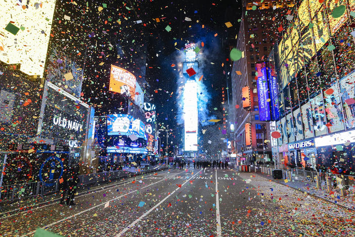 Confetti falls at midnight during a virtual New Year's Eve celebration in New York City's Times Square on Jan. 1, 2021. The annual New Year's Eve ball drop event, which typically draws more than 1 million people, was closed to the public due to the COVID-19 risk.