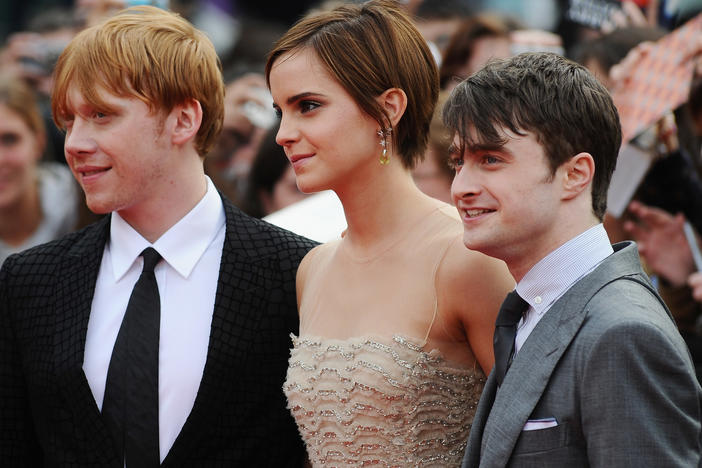 Rupert Grint, Emma Watson and Daniel Radcliffe attend the World Premiere of Harry Potter and The Deathly Hallows - Part 2 at Trafalgar Square on July 7, 2011 in London, England.