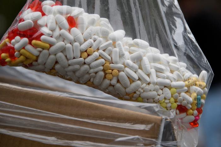 A bag of assorted pills and prescription drugs dropped off for disposal is displayed during the Drug Enforcement Administration's 20th National Prescription Drug Take Back Day earlier this year in Los Angeles. According to the Centers for Disease Control and Prevention, more than  100,000 people died of a drug overdose from April 2020 to April 2021.