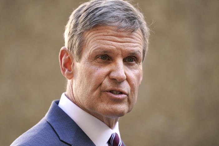 Tennessee Gov. Bill Lee speaks to reporters Tuesday, Jan. 19, 2021, in Nashville, Tenn. He released a video on Wednesday inviting law enforcement officers from across the country to join the Tennessee Highway Patrol.
