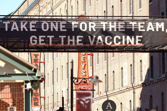 A sign outside Camden Yards in Baltimore, Maryland, encourages people to get a COVID-19 vaccine.