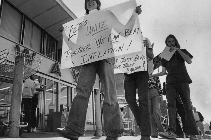 Members of Citizens Against Inflation picket a Denver supermarket in 1974. They asked shoppers to sign petitions calling for a rollback of prices as one method of combating inflation.