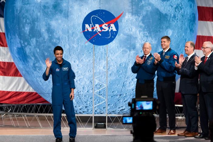 NASA astronaut Jessica Watkins waves at the audience during the astronaut graduation ceremony at Johnson Space Center in Houston, Texas, in January 2020. In April 2022, she will become the first Black woman to live and work on the International Space Station.