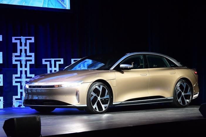 The Lucid Air takes the stage at the 2021 LA Autoshow on November 17, 2021. The luxury electric sedan won the 2022 Motortrend Car of the Year award this month.