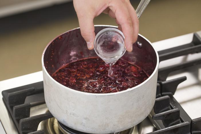 This cranberry sauce recipe calls for orange zest as well as orange liqueur like Grand Marnier.