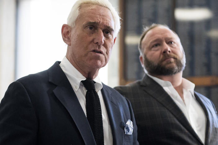 Roger Stone, left, and Alex Jones hold a press conference before attending a House Judiciary Committee hearing in 2018.