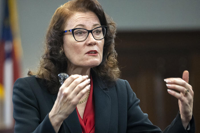 Prosecutor Linda Dunikoski presents a closing argument to the jury during the trial of Travis McMichael, Gregory McMichael and William "Roddie" Bryan on Monday at the Glynn County Courthouse in Brunswick, Georgia. The three men are charged in the February 2020 killing of Ahmaud Arbery.