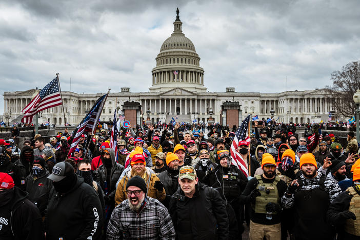 Pro-Trump protesters gather in front of the U.S. Capitol on Jan. 6 in Washington, D.C. The mob stormed the Capitol, breaking windows and clashing with police officers.