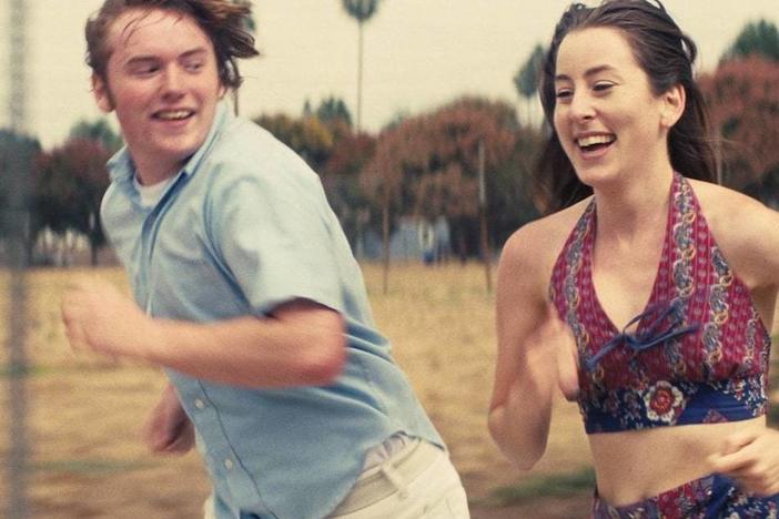 Cooper Hoffman and Alana Haim are unlikely friends in <em>Licorice Pizza.</em>