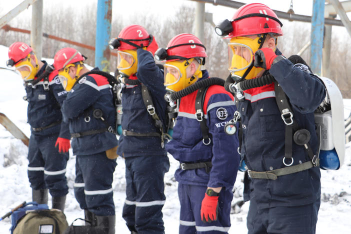 In this Russian Emergency Situations Ministry Thursday, Nov. 25, 2021 photo, rescuers prepare to work at a fire scene at a coal mine near the Siberian city of Kemerovo, about 3,000 kilometres (1,900 miles) east of Moscow, Russia,. Russian authorities say a fire at a coal mine in Siberia has killed nine people and injured 44 others. Dozens of others are still trapped.