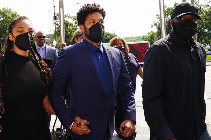 Actor Jussie Smollett, center, arriving at Leighton Criminal Court in Chicago in July. at the  Building on July 14, 2021, in Chicago.