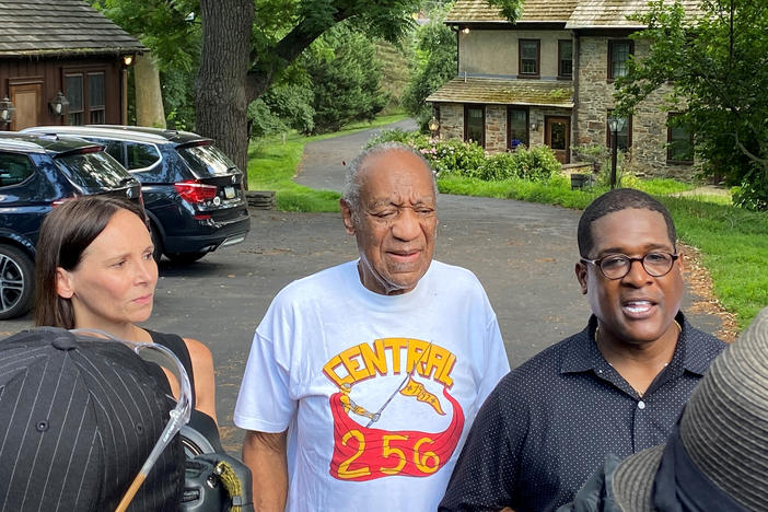 Attorney Jennifer Bonjean, Bill Cosby, and spokesperson Andrew Wyatt speaking outside of Cosby's suburban Philadelphia home in June, after the actor was released from prison.