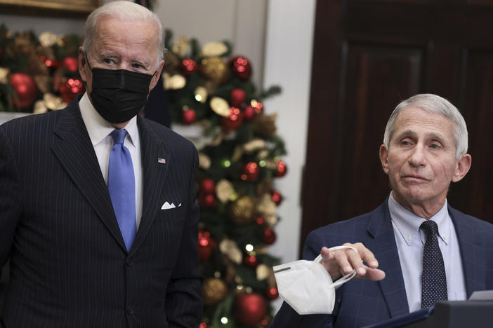 Anthony Fauci (right), director of the National Institute of Allergy and Infectious Diseases and chief medical adviser to the president, speaks alongside President Biden following a meeting of the COVID-19 response team at the White House on Monday.