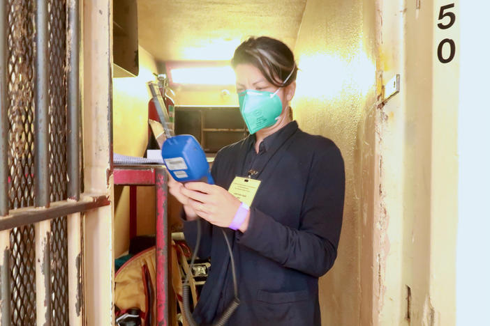 Rachel Sklar, an environmental epidemiologist and postdoctoral scholar is seen at the San Quentin State Prison in California, collecting data on COVID-19 transmission in the state's prison population. Sklar, who is of Filipino descent, says she has been denied an academic opportunity because some institutions do not consider her to be from a racial group that is underrepresented in STEM.