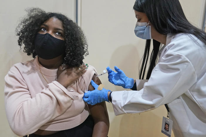 Keidy Ventura, 17, receives her first dose of the Pfizer COVID-19 vaccine in West New York, N.J. Pfizer has asked federal regulators to expand the eligibility for booster shots to include 16- and 17-year-olds.