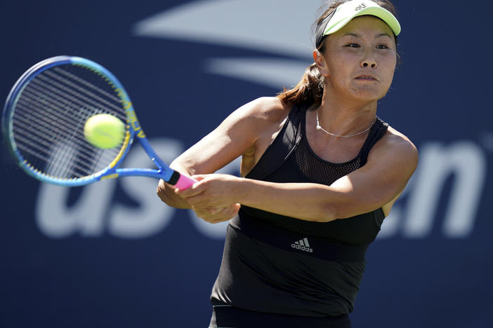 Chinese tennis star Peng Shuai plays during the second round of the U.S.Open tennis championships in 2019. The Women's Tennis Association says they are canceling all tournaments in China after Peng Shuai was silenced after revealing her sexual assault.