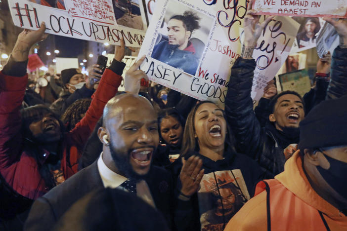 Tamala Payne (center) and attorney Sean Walton participate in a Dec. 11, 2020, protest of the shooting of her son, Casey Goodson Jr., by a Franklin County deputy sheriff in Columbus, Ohio.