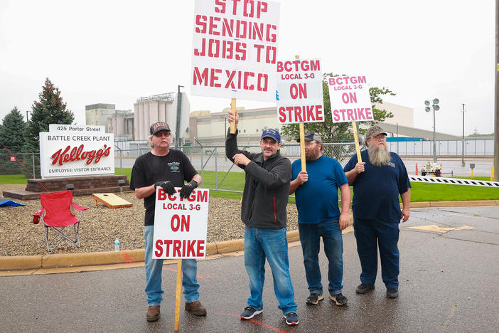 Kellogg workers demonstrate in front of one of the company's cereal plants in Battle Creek, Mich., on Oct. 7
