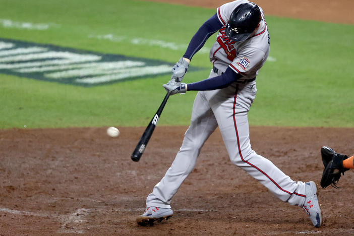Freddie Freeman of the Atlanta Braves hits a solo home run against the Houston Astros in Game Six of the World Series in November.