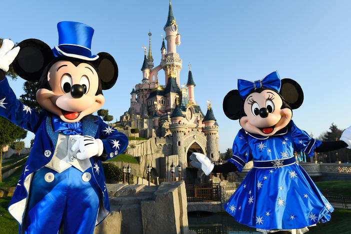 Mickey and Minnie in front of the Sleeping Beauty Castle, marking the 25th anniversary of Disneyland - originally Euro Disney Resort.