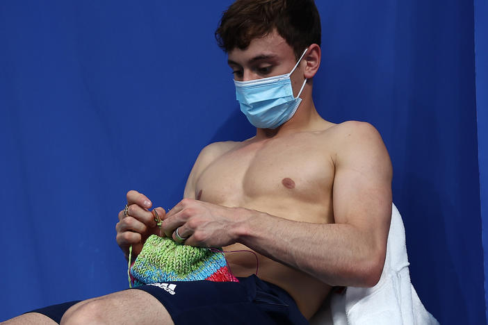 Tom Daley said his work on knitting projects helped him stay calm between events at the Tokyo Olympics, where he won a gold medal. He recently launched an online store, selling knitting kits.