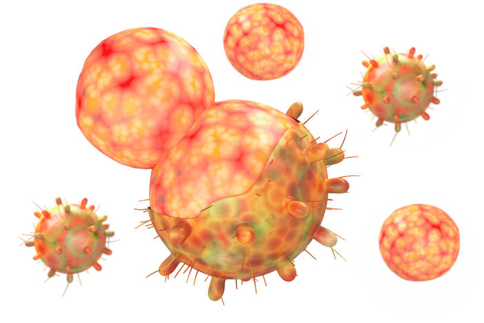 A 3D-generated image of the coronavirus variant of concern known as omicron. The little bumps are spike proteins (see definition below).