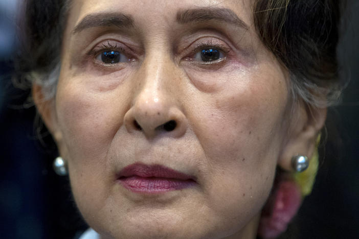 A Myanmar court on Monday sentenced ousted leader Aung San Suu Kyi to four years for incitement and breaking virus restrictions. In this photo from December 2019, Suu Kyi waits to address judges of the International Court of Justice on the second day of three days of hearings in The Hague, Netherlands.