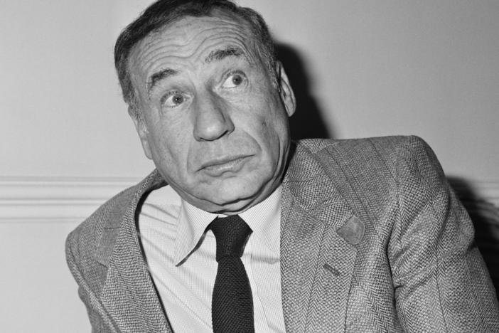 Mel Brooks (shown here in 1984) calls comedy his "delicious refuge" from the world: "I hide in humor and comedy. I love it."