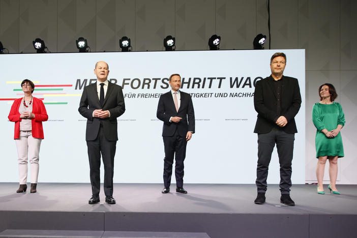 Members of three German parties at the signing of a coalition agreement are (from left) Social Democrats Norbert Walter-Borjan, Saskia Esken and new Chancellor Olaf Scholz, Free Democrat Christian Lindner, and the Green party's Robert Habeck and Annalena Baerbock on Tuesday in Berlin.