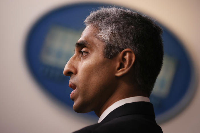 U.S. Surgeon General Vivek Murthy talks to reporters at the White House on July 15.