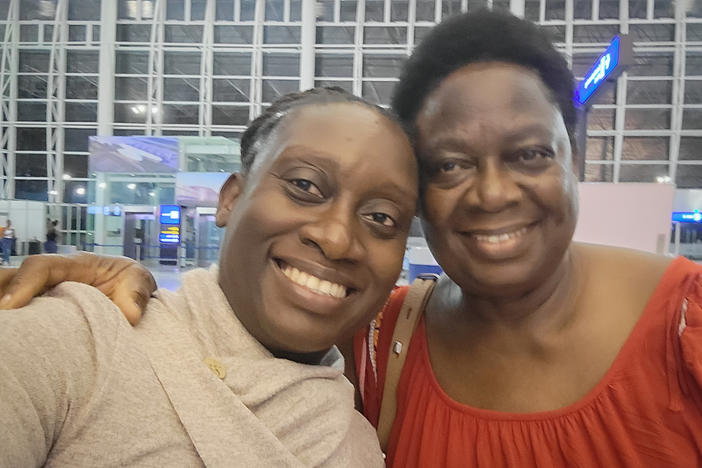 Jacqueline Muna Musiitwa, left, and her mom, Anne Sikwibele, at the airport in Lusaka, Zambia, in November. Musiitwa, who lives in Washington, D.C., is worried that her mom may not be able to visit the U.S. for Christmas. In an effort to stem the spread of the omicron variant, several nations have imposed travel bans on southern African nations, which are in a state of flux.