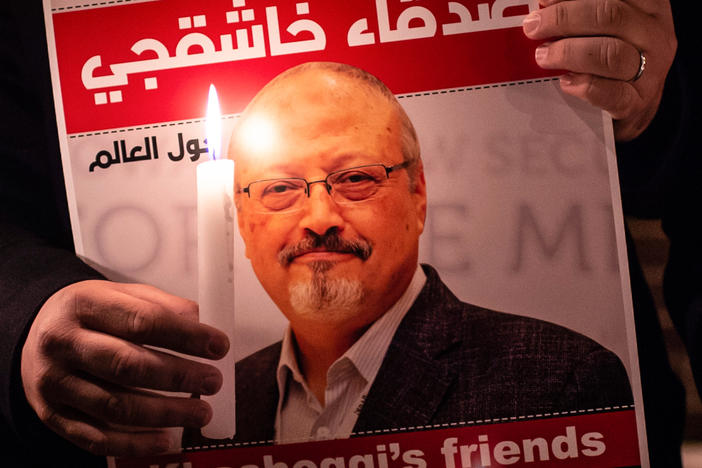 A demonstrator holds a poster of Saudi journalist Jamal Khashoggi during a gathering outside the Saudi Arabia consulate in Istanbul, on Oct. 25, 2018. Khashoggi, a Washington Post contributor, was killed on Oct. 2, 2018 after a visit to the Saudi consulate in Istanbul.